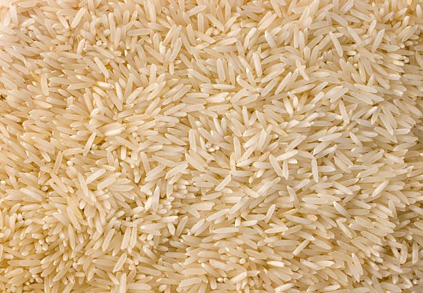 Subject: One of a series of rice textures. Indian Basmati rice, an extra long grain rice originated from the Indian subcontinent.